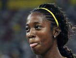 „Reuters“/„Scanpix“ nuotr. /Jamaikietės atletės Shelly-Ann Fraser kuklus gestas.
