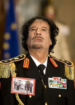 Scanpix nuotr./Libijos diktatorius Muammaras Khadafi