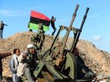 „Scanpix“ nuotr./Libijos sukilėliai prie zenitinio pabūklo