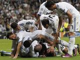 „Reuters“/„Scanpix“ nuotr./Madrido „Real“ žaidėjai džiaugiasi įvarčiu.