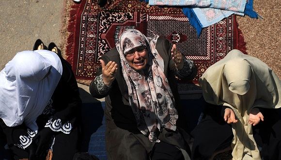 AFP/Scanpix nuotr./Prievartą patyrusios moterys dažniausiai tampa atstumtosiomis