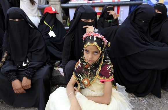 Scanpix nuotr./Jemene mergaitės neretai iatekinamos nesulaukusios nė deaimties metukų