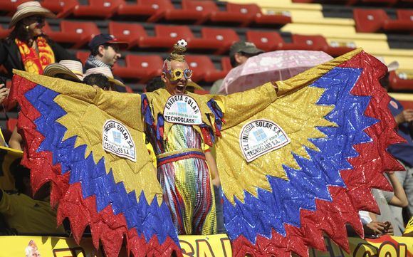 Reuters/Scanpix nuotr./Pietų Amerikos futbolo fanai itin spalvingi