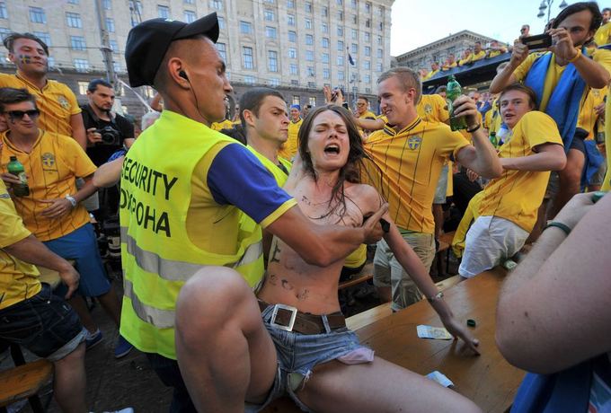 AFP/Scanpix nuotr./Femen aktyvistės protestas Kijeve