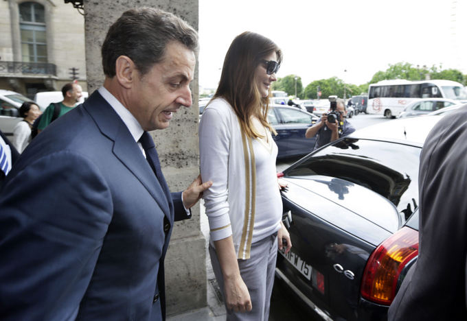 AFP/Scanpix nuotr./Nicolas Sarkozy ir Carla Bruni