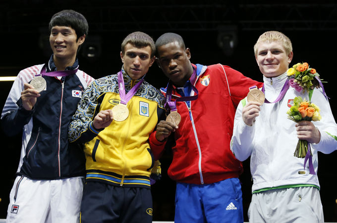 AFP/Scanpix nuotr./Soonchulas Hanas, Vasilijus Lomačenka, Yasnielis Toledo Lopezas ir Evaldas Petrauskas