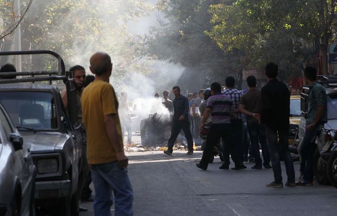 AFP/Scanpix nuotr./Iranas. Protestai Teherane spalio pradzioje