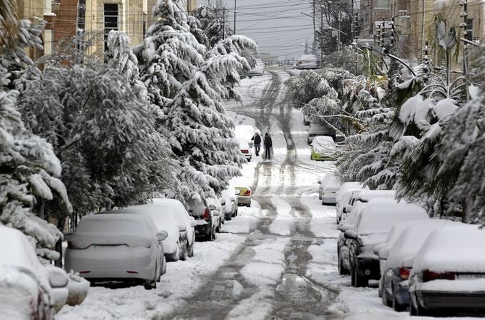 AFP/Scanpix nuotr./Sniegas Izraelyje