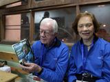 AFP/„Scanpix“ nuotr./Jimmy Carteris su žmona Rosalynn Carter