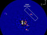 RC-HIA, C. Marois & Keck Observatory nuotr./130 šviesmečių atstumu nuo Žemės nutolusi žvaigždė „HR 8799“ ir aplink ją išsidėliojusios milžiniškos planetos. 