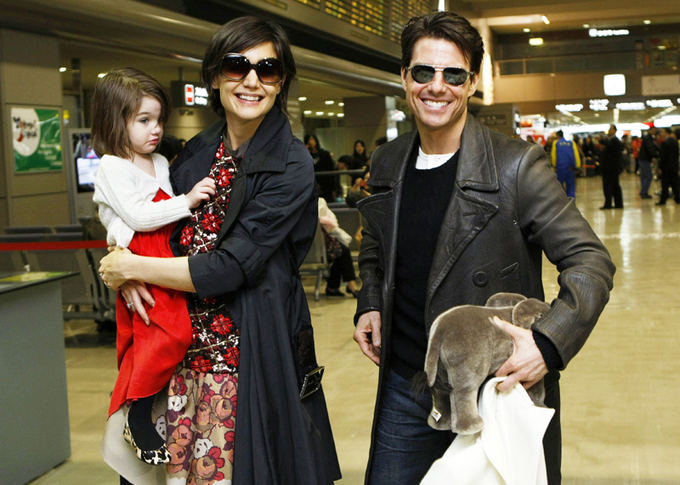 Scanpix nuotr. / Katie Holmes ir Tomas Cruise Japonijoje, kur aktorius reklamuoja savo filmą Valkirija. 
