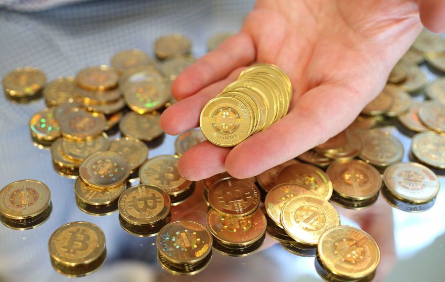 investuojant į bitkoinus tenka pirkti pilnas monetas