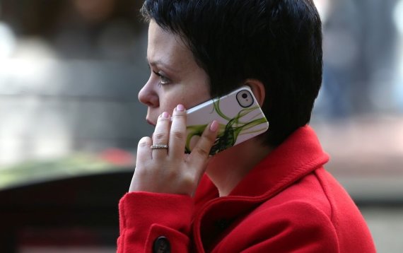 AFP / Scanpix photo / Woman talking on the phone