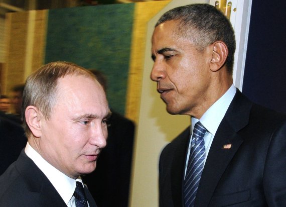 AFP / Photo by Scanpix / Vladimir Putin and Barack Obama