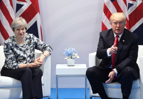  AFP / "Scanpix" nuotr./Theresa May ir Donaldas Trumpas 