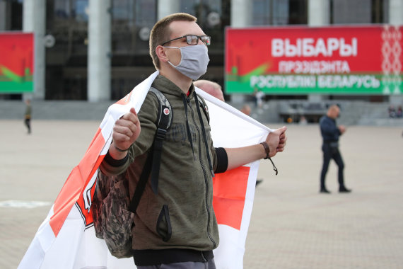 Photo by TASS / Protester in Belarus.