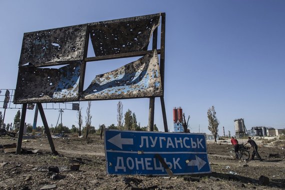   Reuters / Scanpix Photo / road sign 