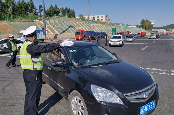 AFP / „Scanpix“ nuotr./Iš dalies uždarytas Džilino miestas Kinijoje