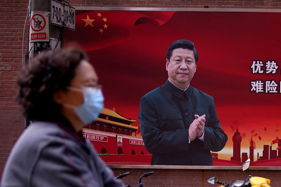 Reuters / Scanpix photo / Poster with a photo of Xi Jinping in Shanghai