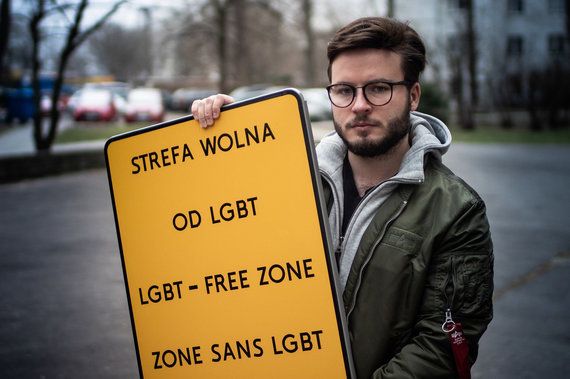 Photo by Przemyslaw Stefaniako / Bart Staszewski with the sign 