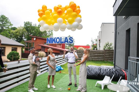 Photo by Vaidas Grudis. Moments of the christening of Nikolas, son of Gerda and Andrius Žemaičiai