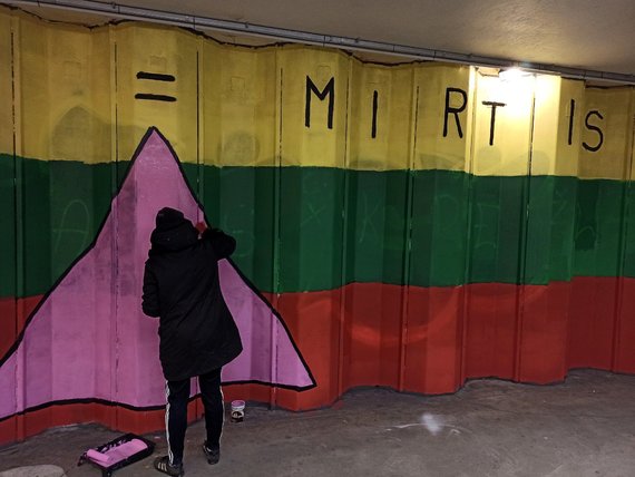 The wall of the Vilnius underground passage was filled with a symbol and inscription important to LGBT history.