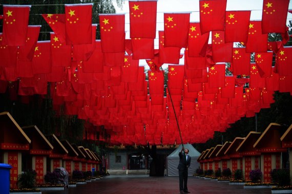 AFP / Scanpix Photo / Chinese flags